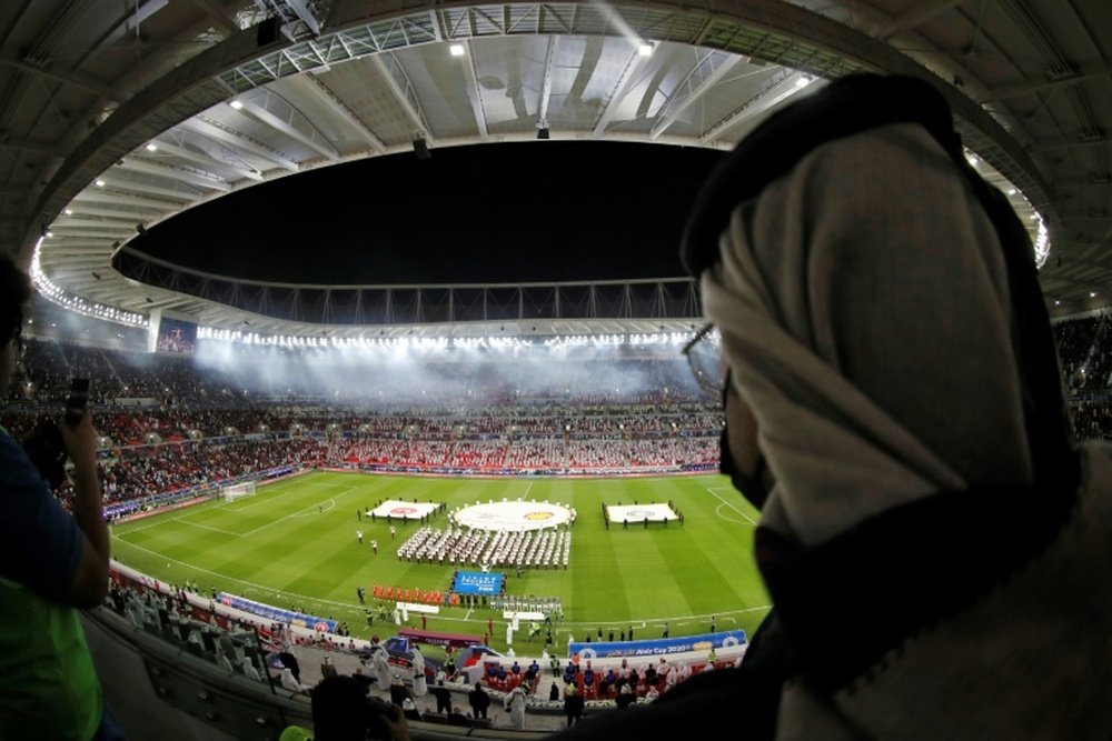 A spectator watches a match at the Ahmad bin Ali stadium in Qatar which will host Club World Cup fixtures