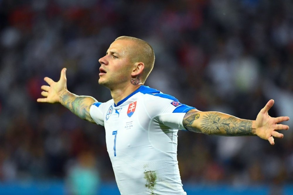 Slovakia's Vladimir Weiss celebrates after scoring against Russia. BeSoccer