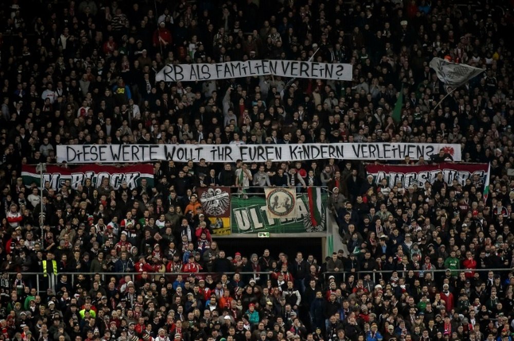 Augsburg fans hold up anti-Leipzig banners detractors of the Red Bull-owned team are now in a sm