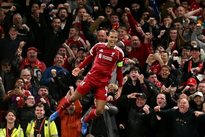 Van Dijk’s late header hands Liverpool dramatic win over Atletico. AFP