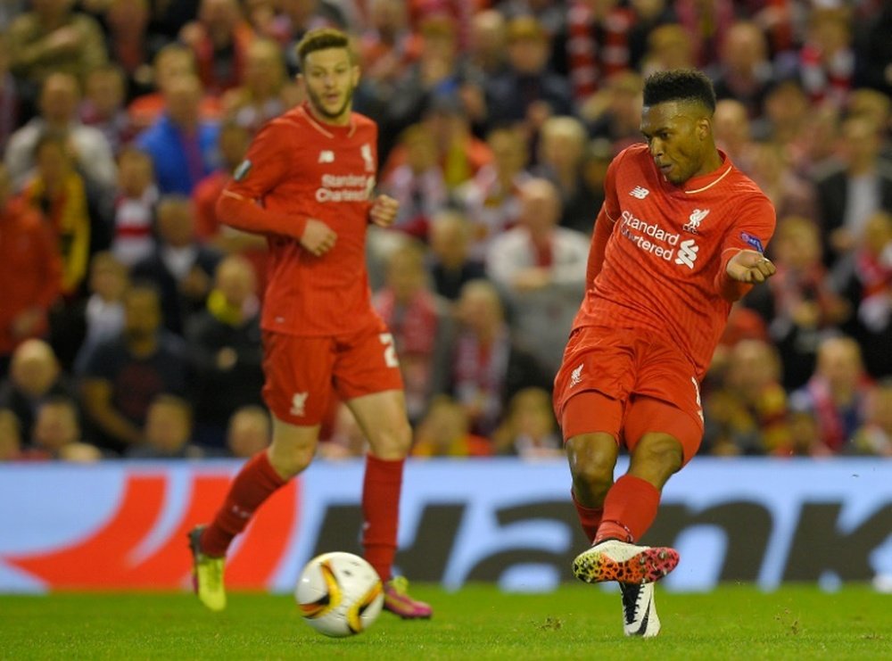 Liverpools English striker Daniel Sturridge (R) scores his teams second goal during the UEFA Europa League semi-final second leg football match between Liverpool and Villarreal CF in Liverpool, England on May 5, 2016