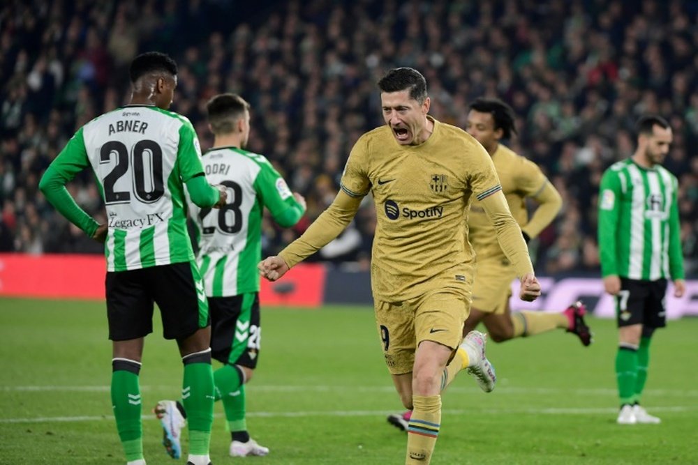 Barcelona's Polish forward Robert Lewandowski celebrates after scoring his team's second goal against Betis