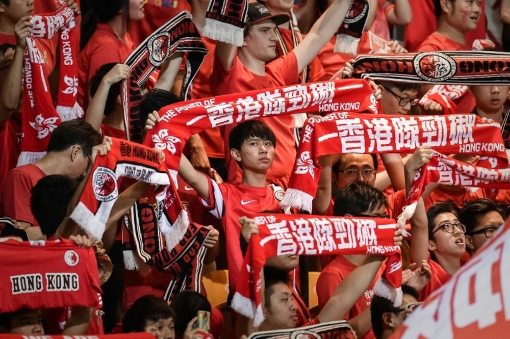 Local football fans watch a 2018 World Cup qualifying match, Hong Kong vs Qatar, in Hong Kong, on September 8, 2015