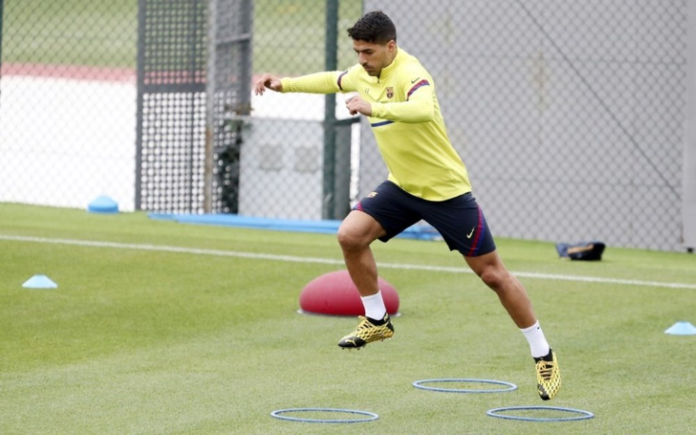 Suárez is back for Barca. AFP