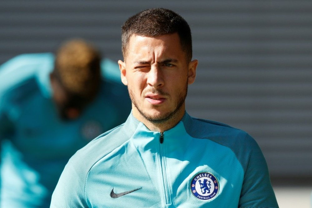 Hazard admits to holding back on training so he can give his all in matches. AFP