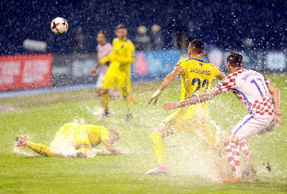 Croatia qualifier abandoned after heavy rain. AFP