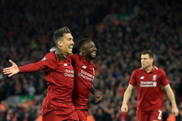 Liverpool celebrate the first leg win. AFP