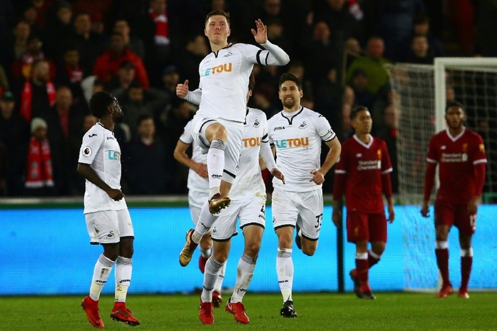 Mawson impressed at Swansea. AFP