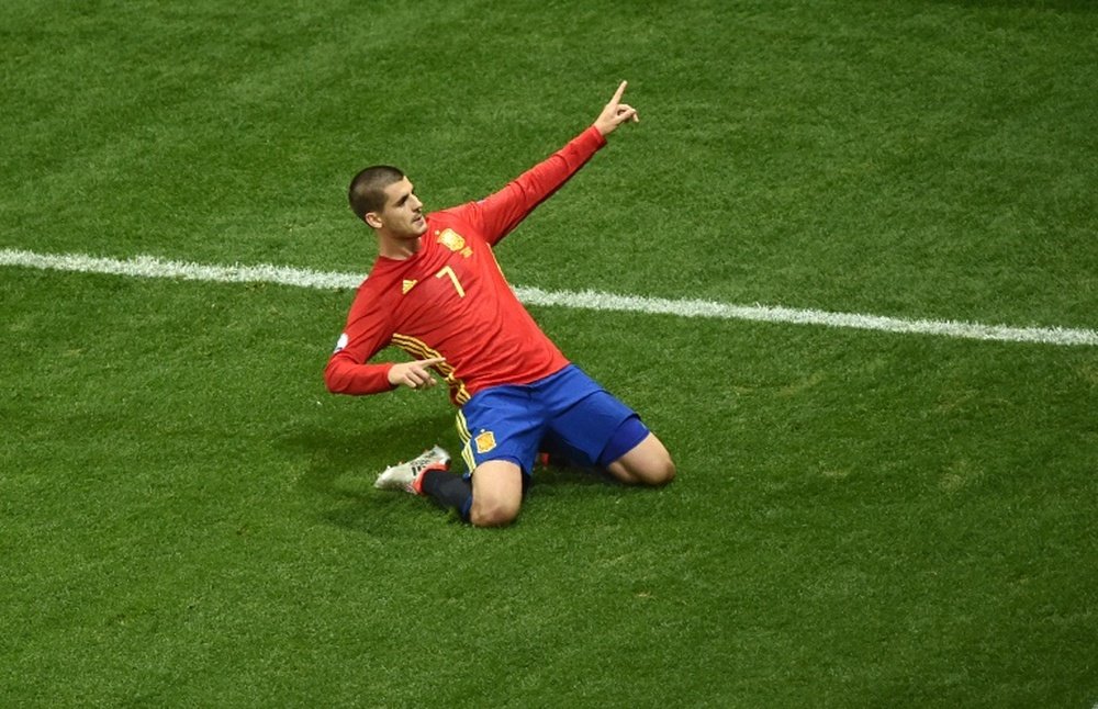 Spains forward Alvaro Morata celebrates after scoring the 1-0 during the Euro 2016 group D football match between Spain and Turkey at the Allianz Riviera stadium in Nice on June 17, 2016