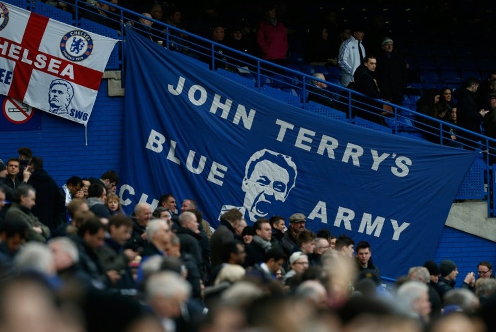 Chelsea fans display a giant banner reading, John Terrys Blue Army ahead of an English Premier League football match against Manchester United at Stamford Bridge in London on February 7, 2016