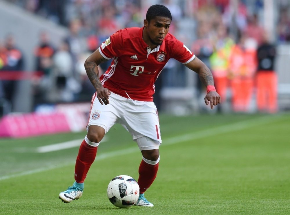 Douglas Costa has joined the Italian champions. AFP
