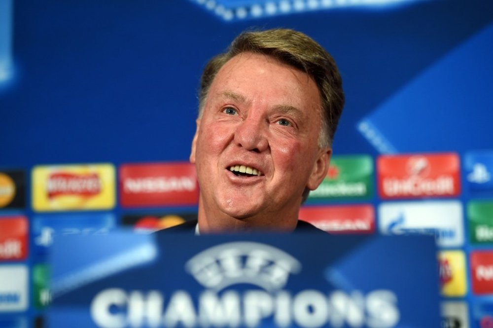 Manchester Uniteds Dutch manager Louis van Gaal smiles during a press conference at Old Trafford in Manchester, England on September 29, 2015 ahead of their UEFA Champions League football match against Wolfsburg on September 30