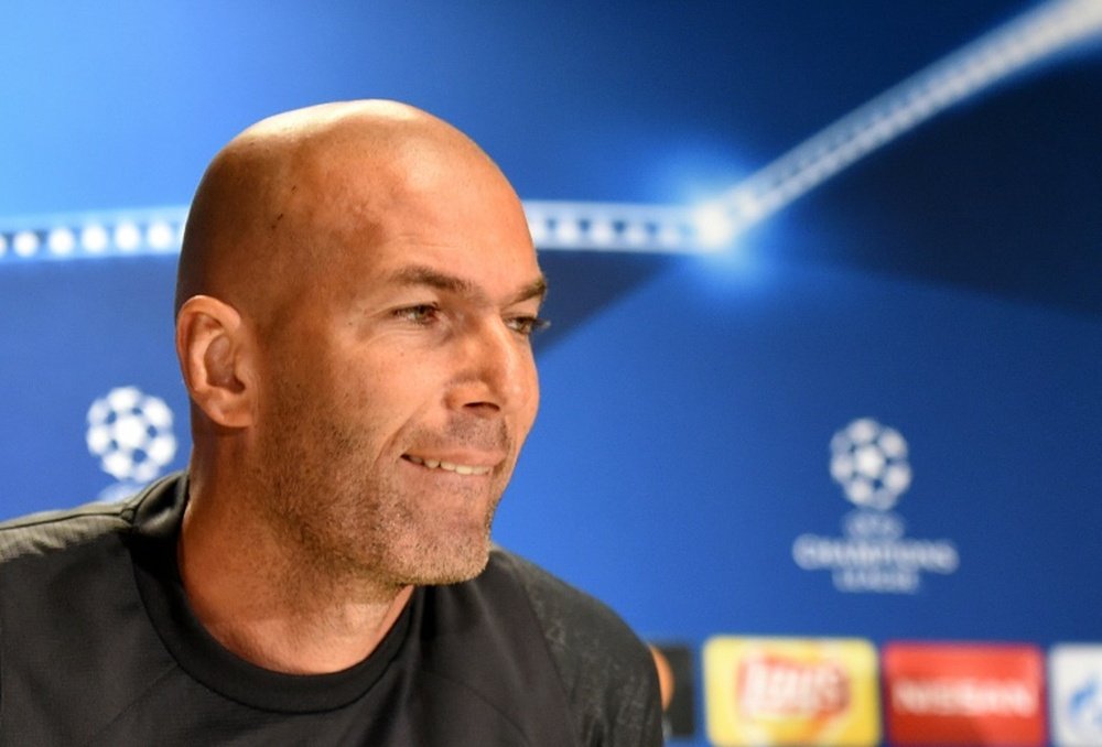 Zidane addresses a press conference at the Legia Warszawa stadium in Warsaw. AFP