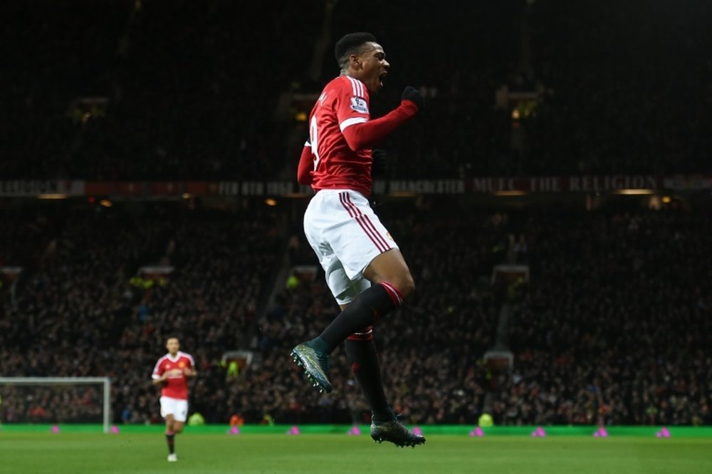 Manchester United's striker Anthony Martial celebrates scoring their second goal during the English Premier League match against Stoke City at Old Trafford in Manchester, on February 2, 2016