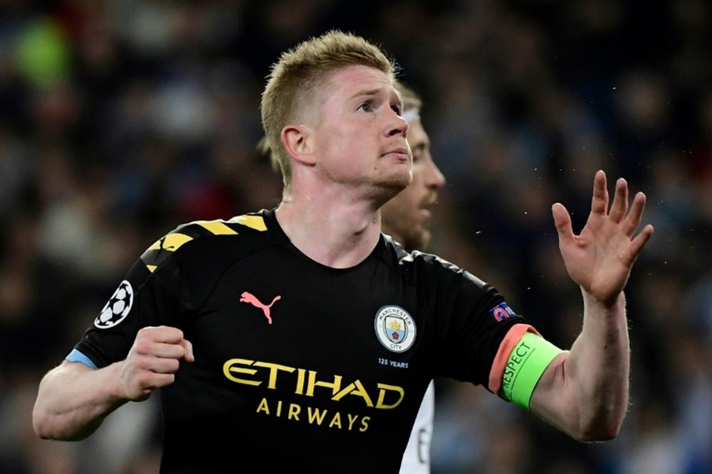 De Bruyne would be willing ot renew at City. AFP