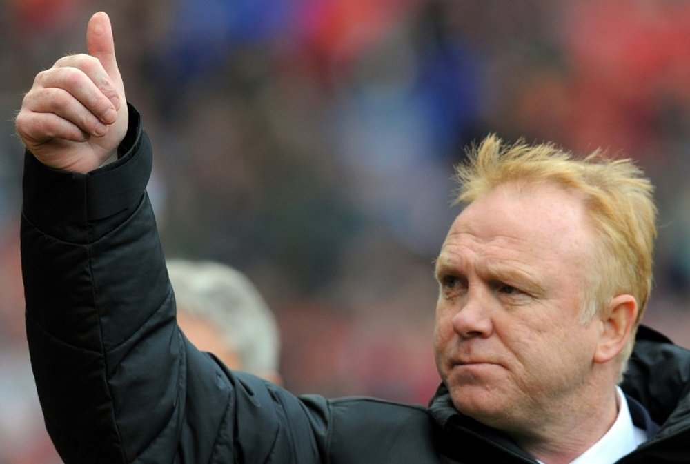 Scotland boss McLeish will give players a 'clean slate'. AFP