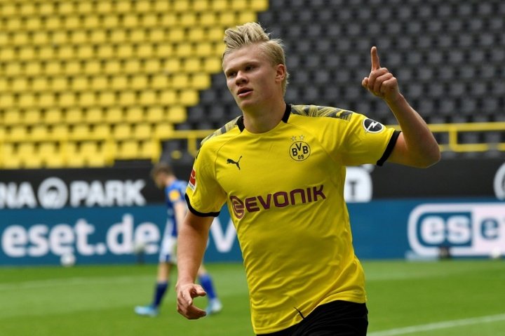 Dortmund celebrates football's return with crushing victory