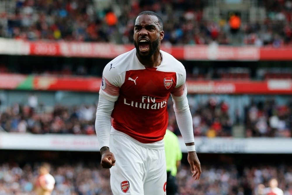 Alexandre Lacazette has revealed that he prefers playing in French stadiums to English ones. AFP