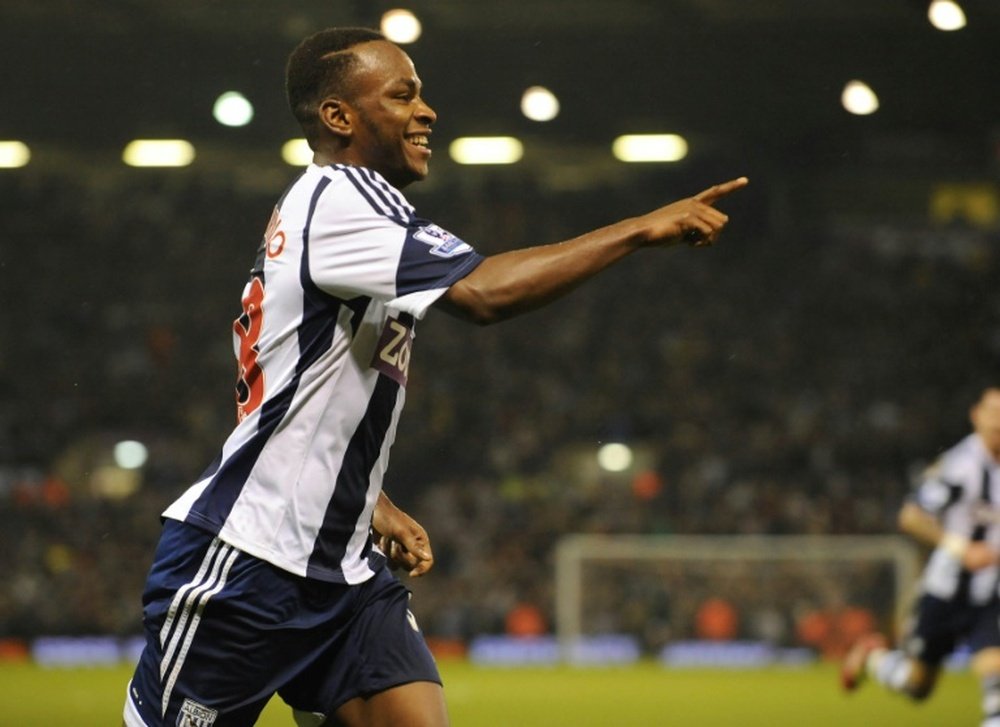 West Bromwich Albions Burundian striker Saido Berahino celebrates scoring a goal during the English Premier League football match between West Bromwich Albion and Newcastle United in West Bromwich, central England, on January 1, 2014