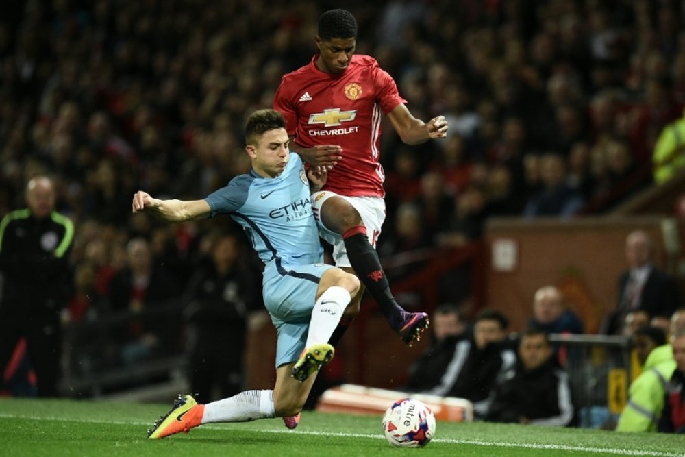 Maffeo (L) in action for Man City against Man Utd in the EFL Cup. AFP