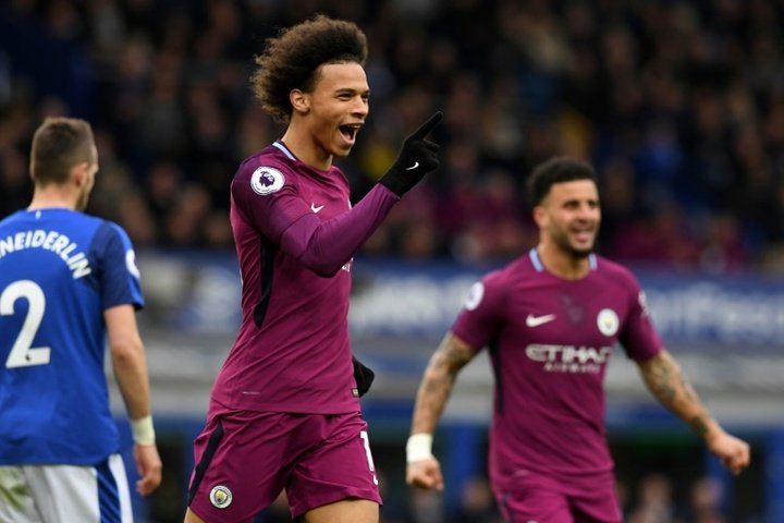 City triumph to move within inches of the title