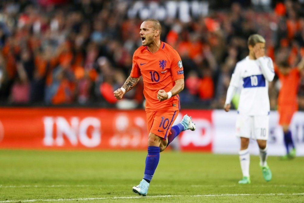 Sneijder y croit. AFP