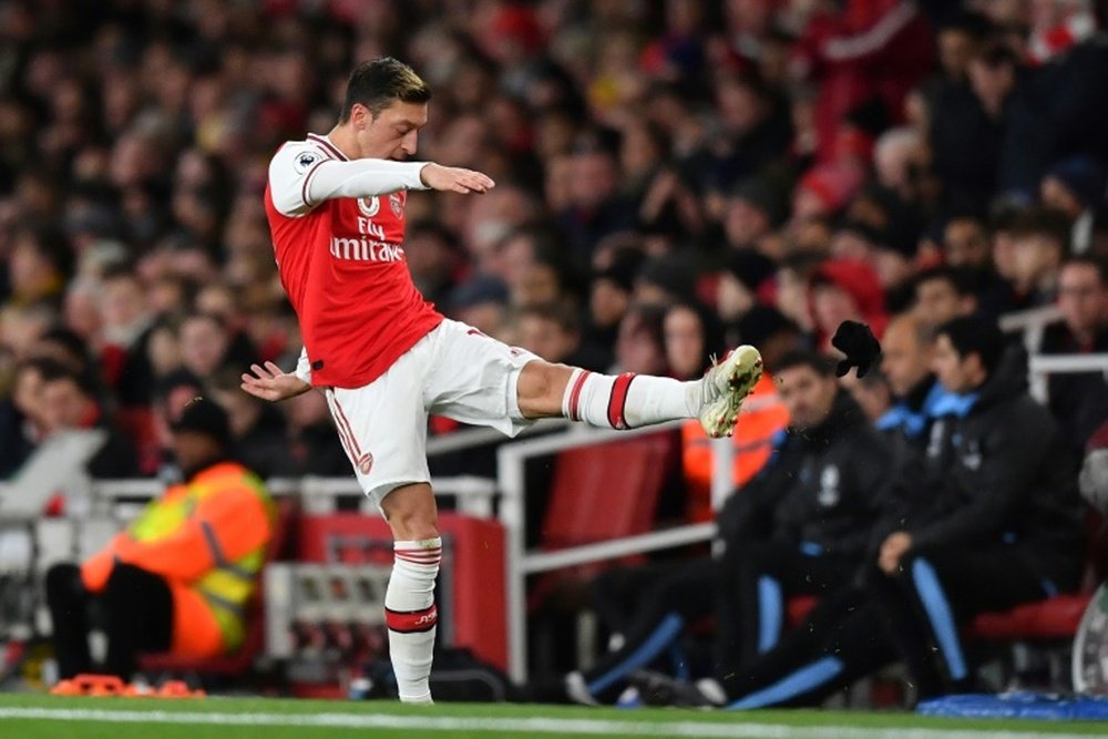 Ozil will leave Arsenal on Sunday. AFP