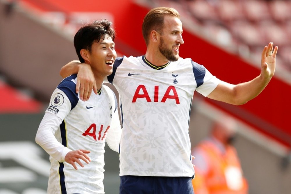 Harry Kane (R) got four assists in Spurs' win over Southampton. AFP