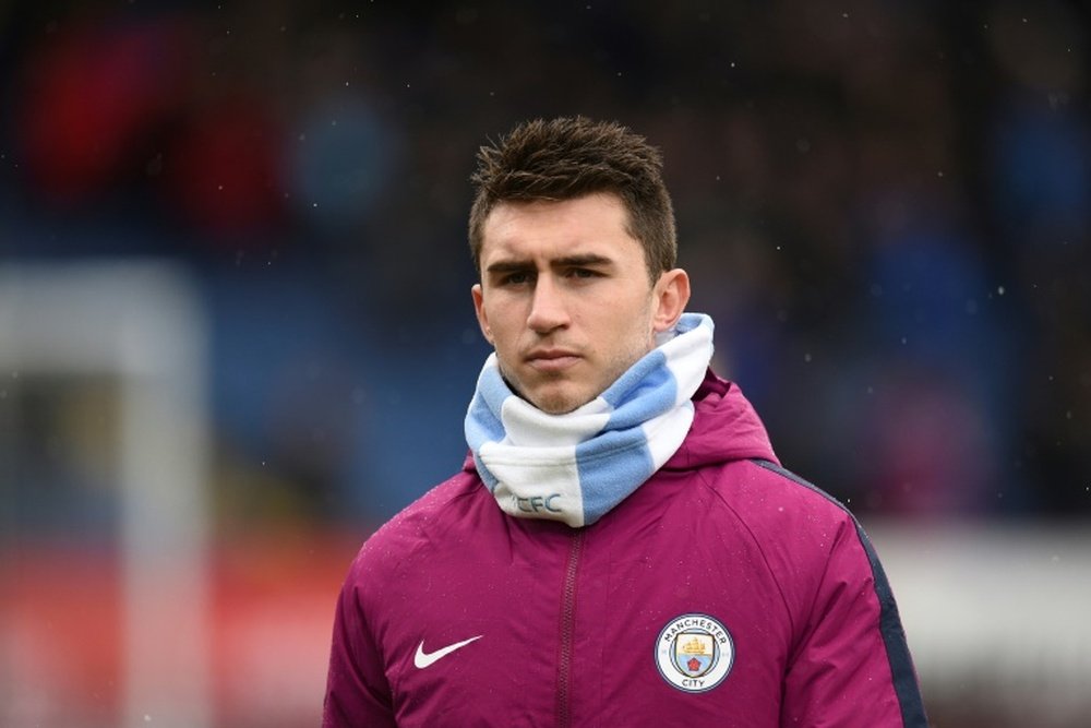 Laporte had a choice to make. AFP