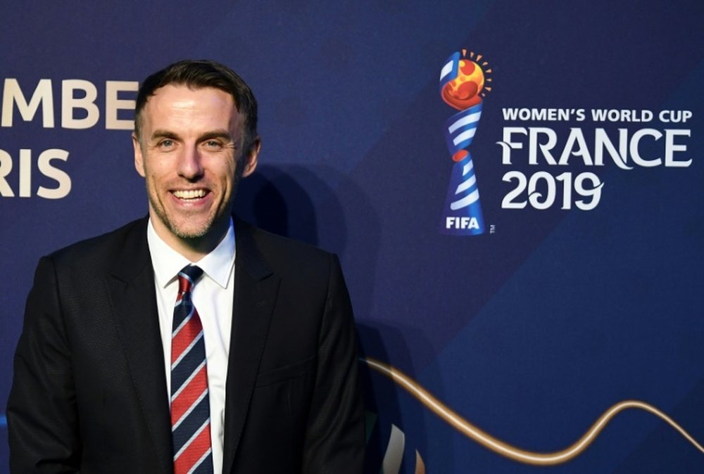 Phil Neville is hoping to mastermind a World Cup triumph next summer. AFP
