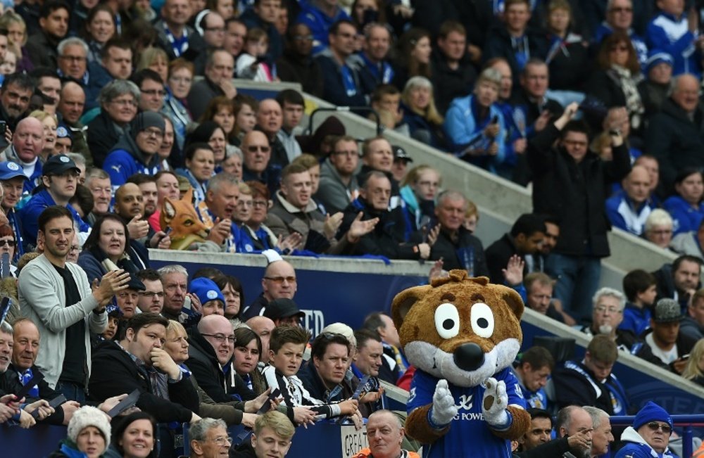 Leicester Citys mascot, Filbert the Fox stands in front of the teams fans during the English Premier League football match between Leicester City and Southampton at King Power Stadium in Leicester, central England on May 9, 2015