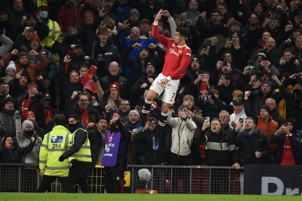 Cristiano qui fête l'un de ses buts face à Arsenal. AFP