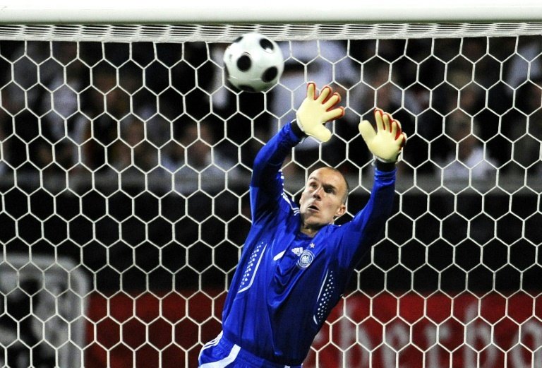Germanys goalkeeper Robert Enke saves the ball on August 20, 2008