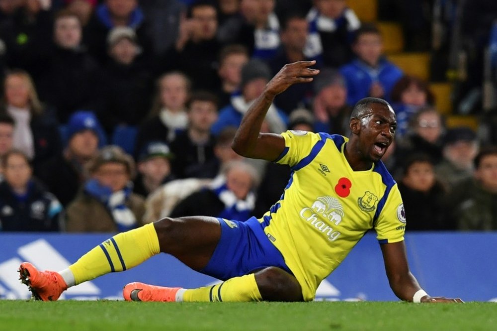 AN Everton player lying on the floor. AFP
