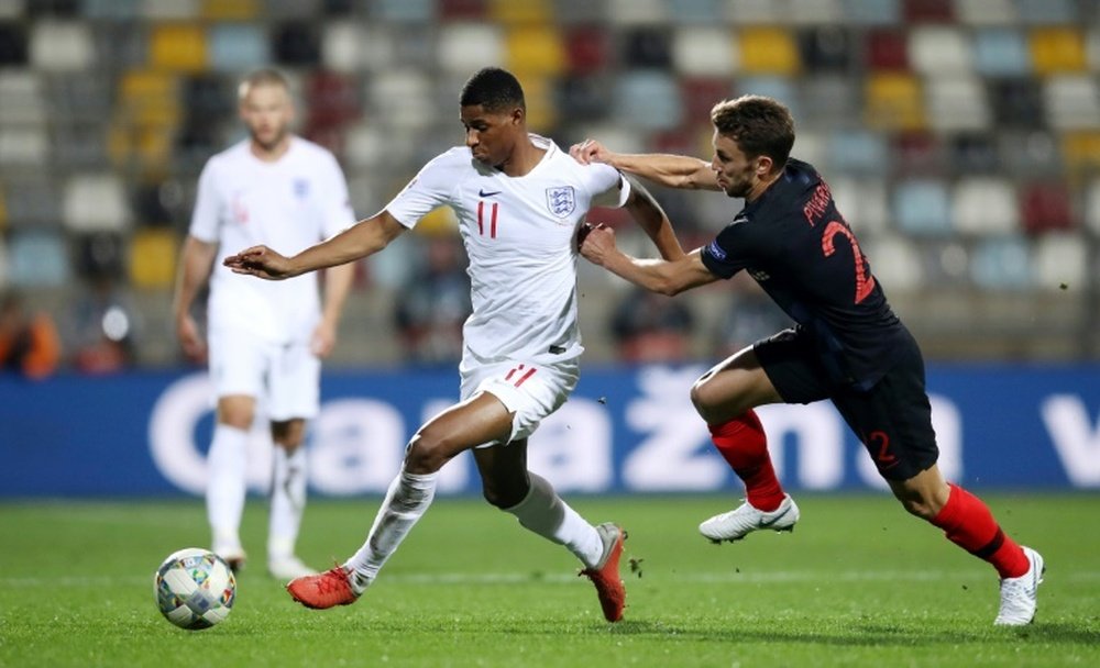 England and Croatia will decide Spain's fate. AFP