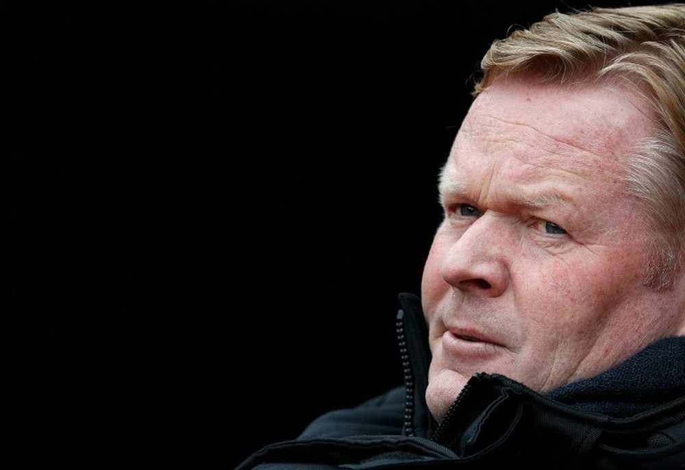 Koeman's Everton squad arrived back on Merseyside in the early hours of Friday. AFP