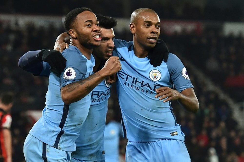 Fernandinho has said that City are ready to fight on all fronts. AFP