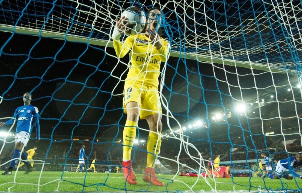 Cavani celebrates scoring against Strasbourg. AFP