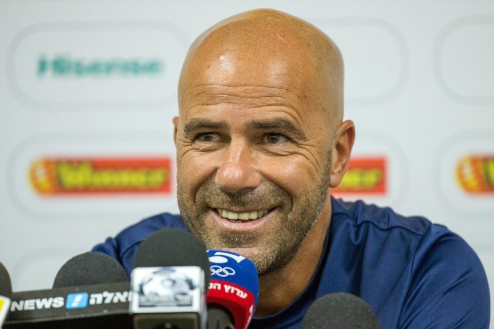 Peter Bosz will leave his coaching position with Maccabi Tel Aviv to join Dutch club Ajax on a three-year contract until June 2019