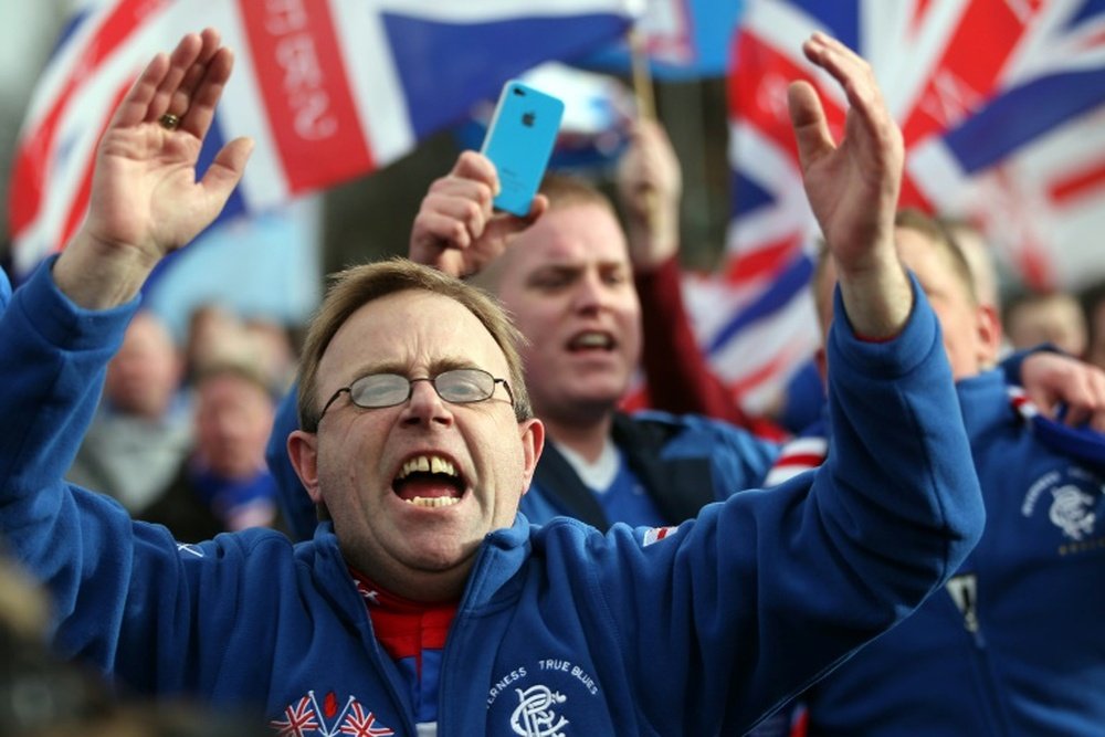 Rangers fans didn't have long to wait to get their first sighting of new signing Joe Garner. AFP