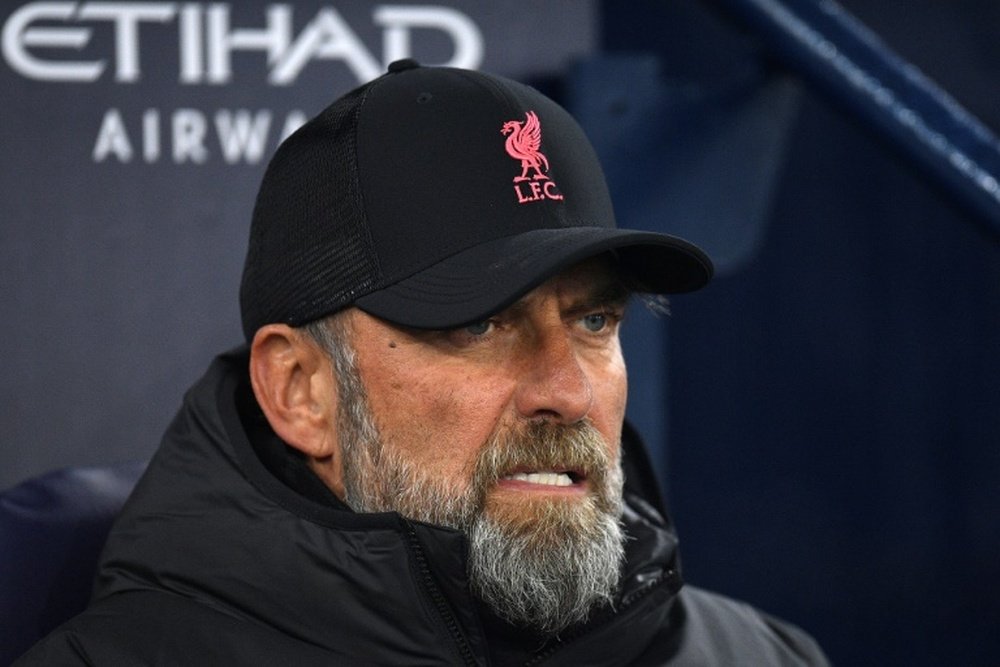 Liverpool will have to play a replay with Wolves. AFP