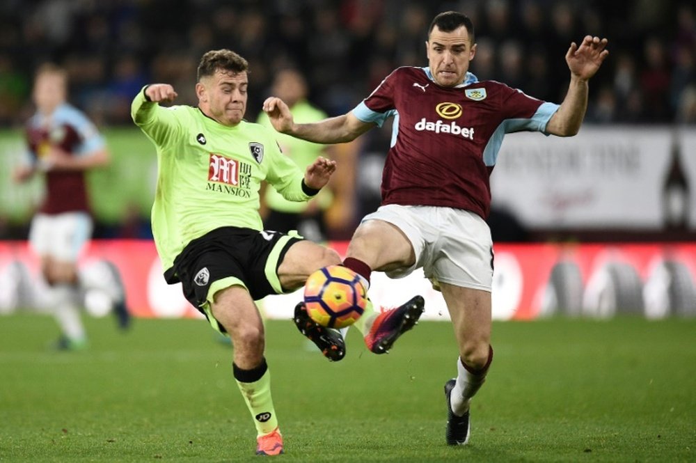 Burnley's Dean Marney (right) in action during a match against Bournemouth. AFP