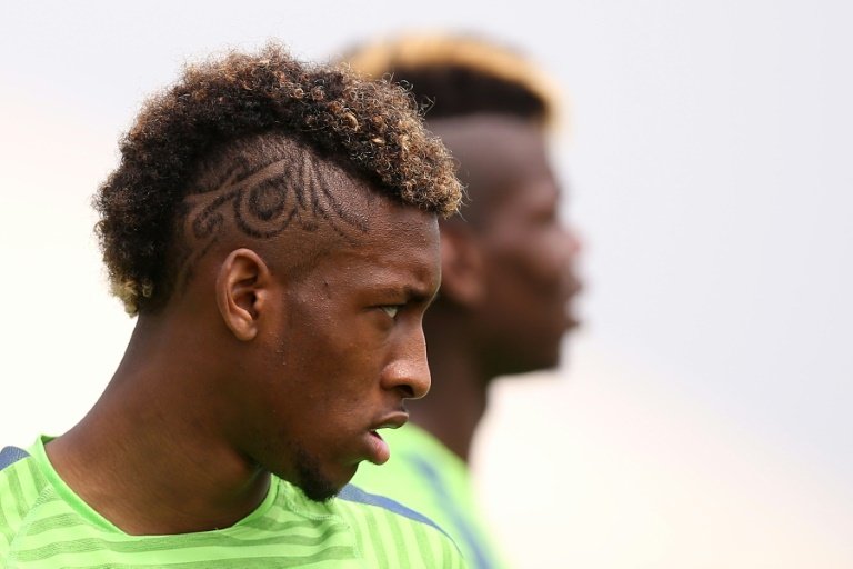 Juventus French midfielder Kingsley Coman takes part in a training session on May 12, 2015 at the Juventus Training Center in Vinovo, near Turin
