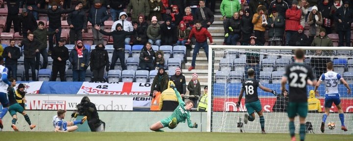 Hughes' immediate impact sees Saints past Wigan