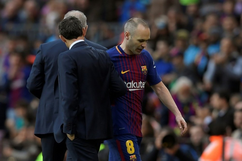 Iniesta could leave Barcelona in the summer. AFP