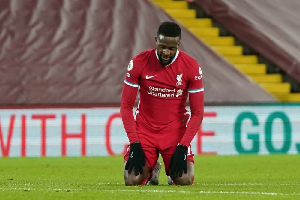 Origi et Shaqiri sur la rampe de sortie. AFP