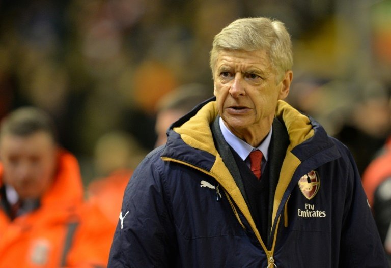 Arsenals French manager Arsene Wenger looks on before the English Premier League football match between Liverpool and Arsenal at Anfield stadium in Liverpool, England on January 13, 2016