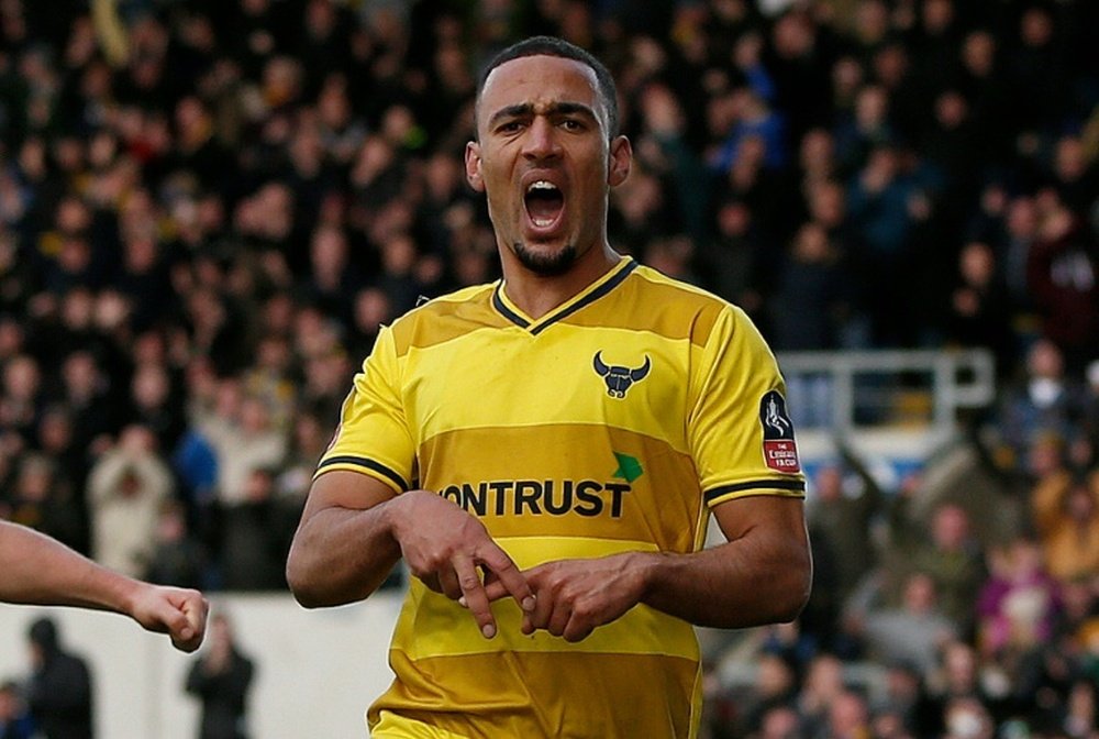 Kemar Roofe scored twice as Oxford United pulled off a major FA Cup shock by stunning Premier League side Swansea City 3-2