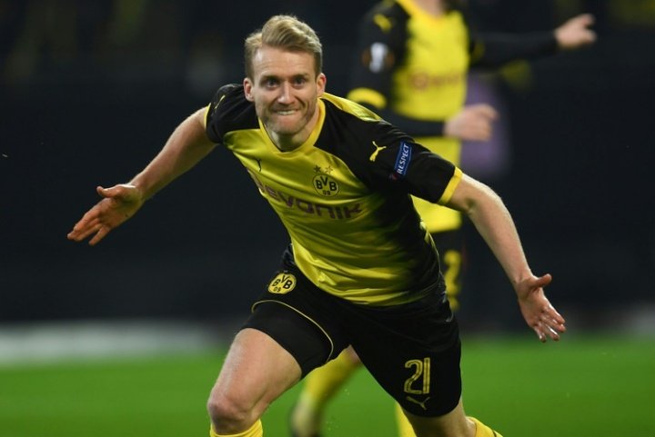 Dortmund advance following hard-fought draw