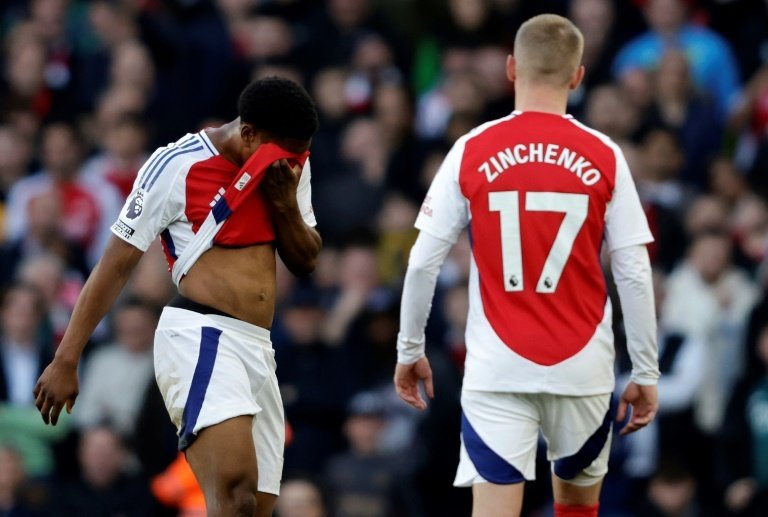 Arsenal's Premier League title bid suffered a huge blow as West Ham earned a shock 1-0 win over the 10-man Gunners, while Tottenham eased the pressure on boss Ange Postecoglou with a 4-1 win at third-bottom Ipswich on Saturday.